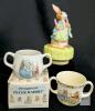 Vintage 1977 Schmid Beatrix Potter Peter Rabbit Music Box, Wedgwood Peter Rabbit Beatrix Potter Double Handled Children's Mug With Original Box & Royal Doulton Bunnykins Double Handled Mug, Up To 7.5" Tall