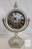 Champs Elysees Mantle Quartz Clock w/Rotating Gears . Measures 15" tall . Tested Working.- requires 3 AA Batteries (not included)