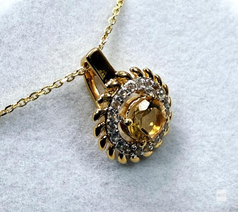 With Appraisal Gold Plated Sterling Silver Natural Citrine (0.50ct) and CZ Pendant with Gold Plated Sterling Silver Chain, W/A $335.00. Citrine is the birthstone for November.