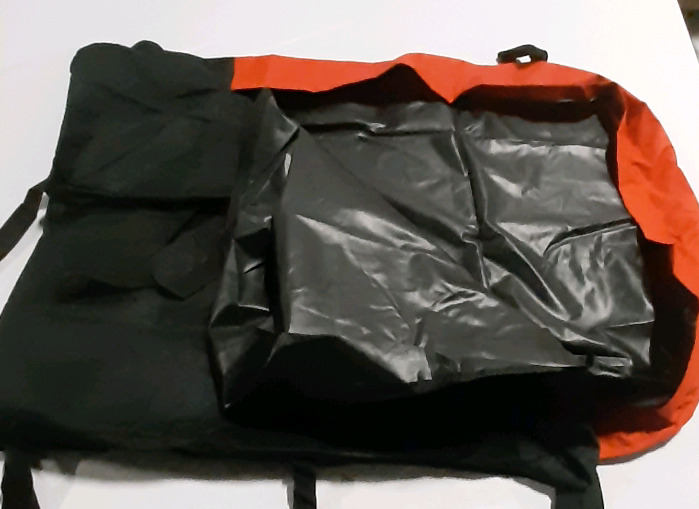 New Large Tote with Straps. Zippered Opening on 3 sides vinyl lining. Measures approximately 39.3" x 31.4" x 15.7".