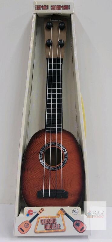 Ricochet Classic Ukulele Toy, 16-Inch Length, 4 Strings, Brown Woodgrain, Age 5+, In Box