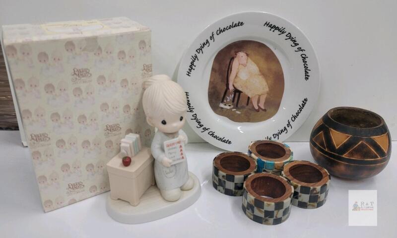 Lot of Mixed Decorative Collectibles and Tableware Precious Moments Teacher Figurine with Box, 'Happily Dying of Chocolate' Plate, Wooden Bowl, Napkin Rings