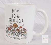 White Ceramic Coffee Mug with Floral Design and "Mom Lola Great-Lola" Text