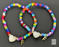 New Pair of ZZLAY Beaded Initial "F" Friendship Bracelets, Elastic Beaded Bracelets With Carved Shell Hearts