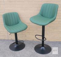 Two (2) New / As New Counter / Bar Chairs w/Adjustable Height . One Chair has small cut . Seat measures 21" - 29" tall