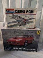 2 Model kits. Revell Ferrari and Monogram Curtiss P-36a