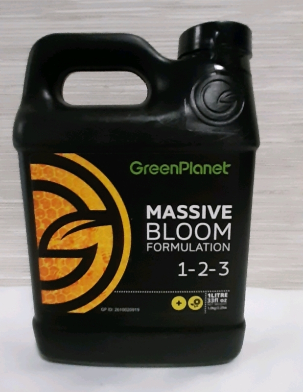 New, Green Planet Massive Bloom Fertilizer. 1 litre container.