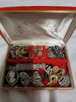 Vintage jewelry box with contents