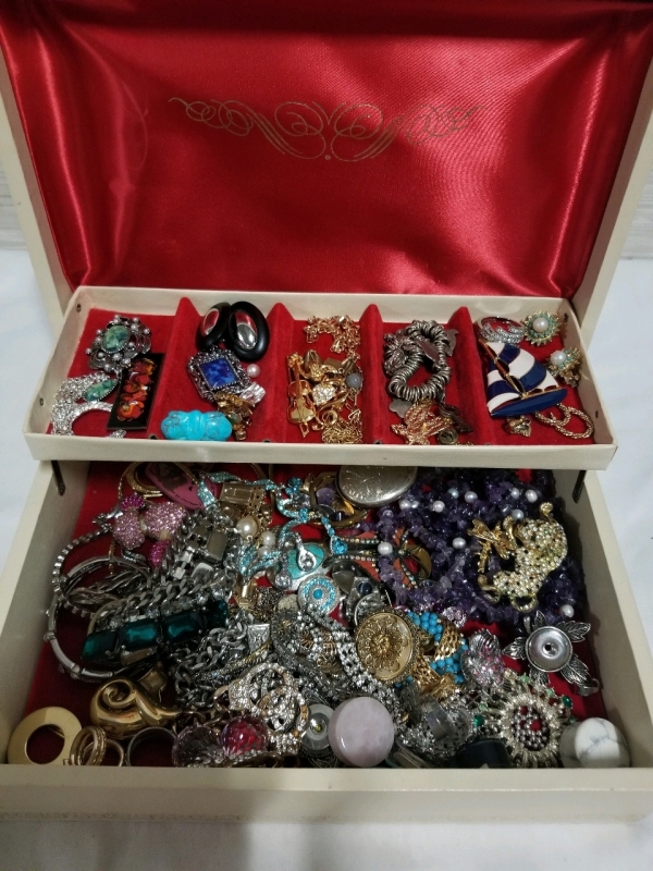 Vintage jewelry box with contents