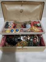 Vintage jewelry box with contents