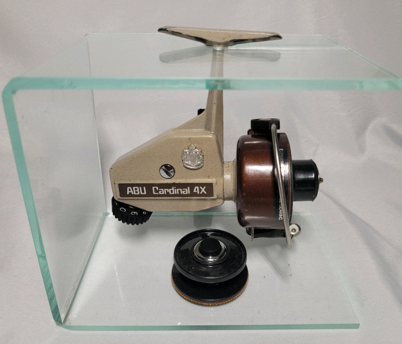 Vintage ABU Cardinal 4X Fishing Reel with Reel Stand - Pre-owned