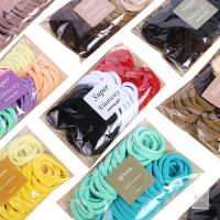 New one pack 100PCS Red, white, black Hair Ties High elastic Women&lsquo;s hair bands Seamless Thick color mixed Hair Band Elastic Hair Ties Hold hair without damage Ponytail Holder