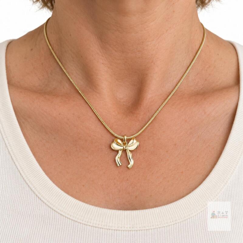 New Risamil Gold-Tone Bow Pendant Necklace