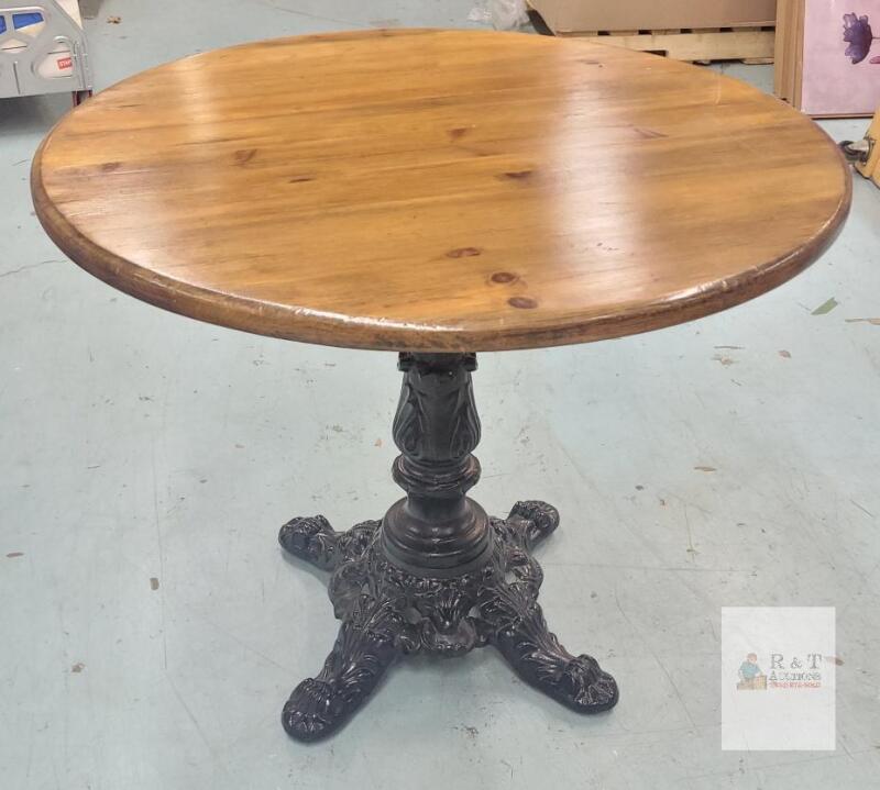 Round Pedestal Bistro Table with Ornate Cast Iron Base and Wooden Top
